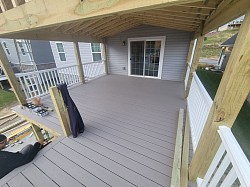 Install Composit Decking.