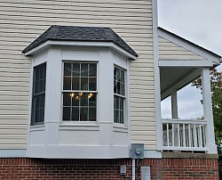 The bay window and porch.